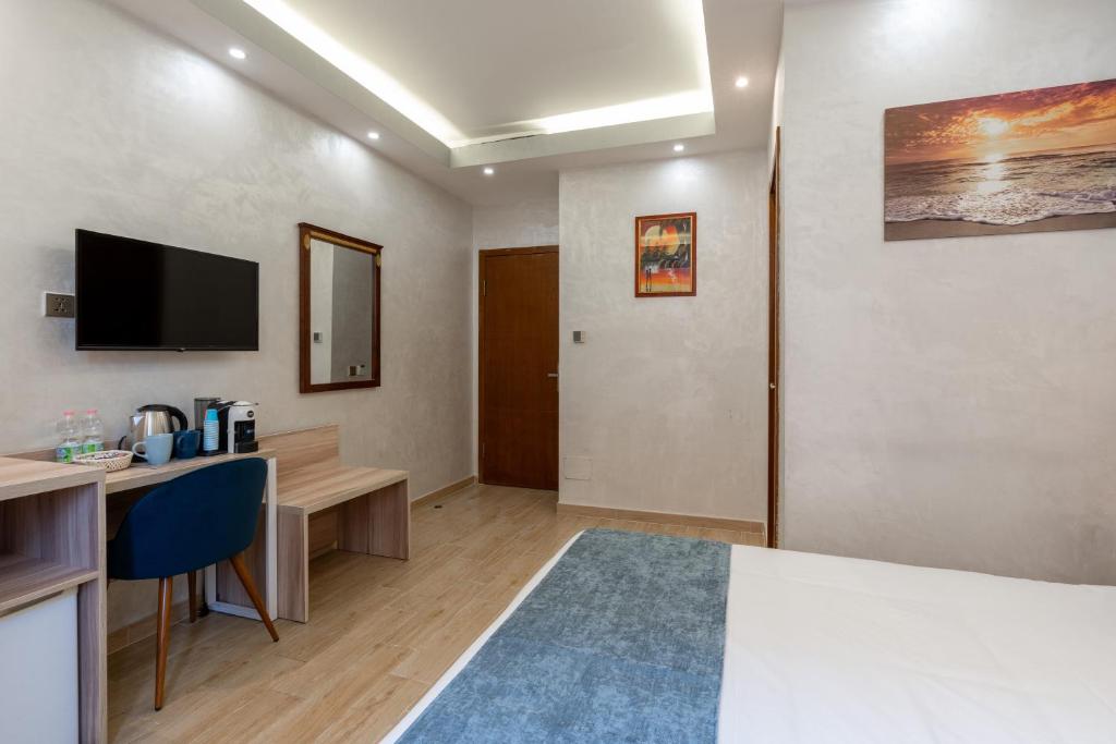 TV a/nebo společenská místnost v ubytování Rome Love Hotel