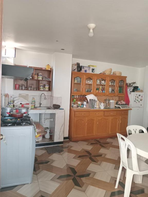 Kuchyň nebo kuchyňský kout v ubytování Menacho's House