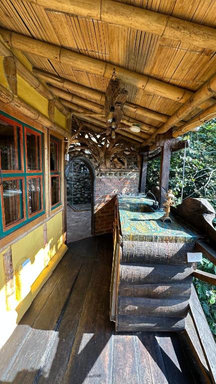 Posezení v ubytování Cabaña entre cafetales en Salento