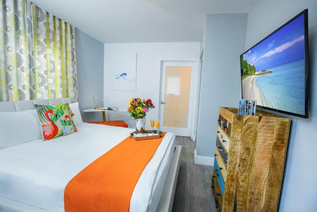 Postel nebo postele na pokoji v ubytování Seaside All Suites Hotel