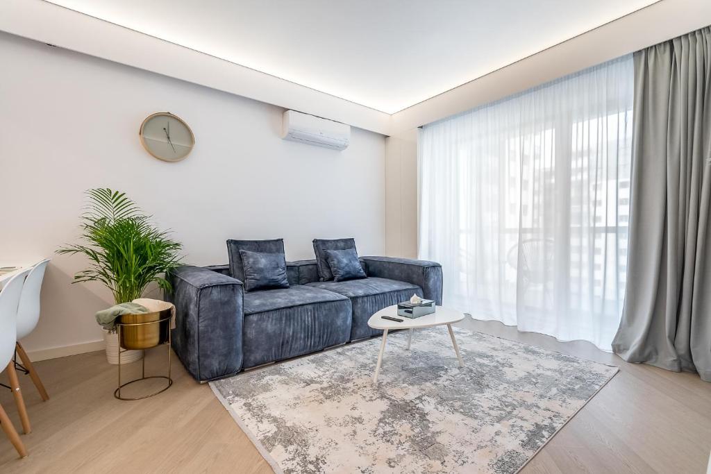 Et opholdsområde på Cortina North Premium Smart Apartment with Parking