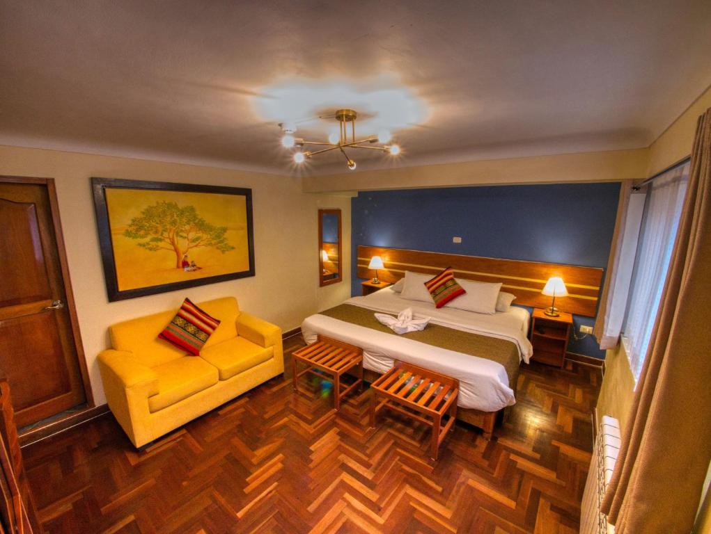 Voodi või voodid majutusasutuse Sol Ollantay Boutique Hotel toas