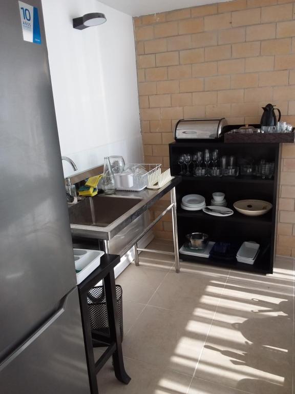 Kuchyň nebo kuchyňský kout v ubytování Piso completo tipo loft independiente y vista de primera linea