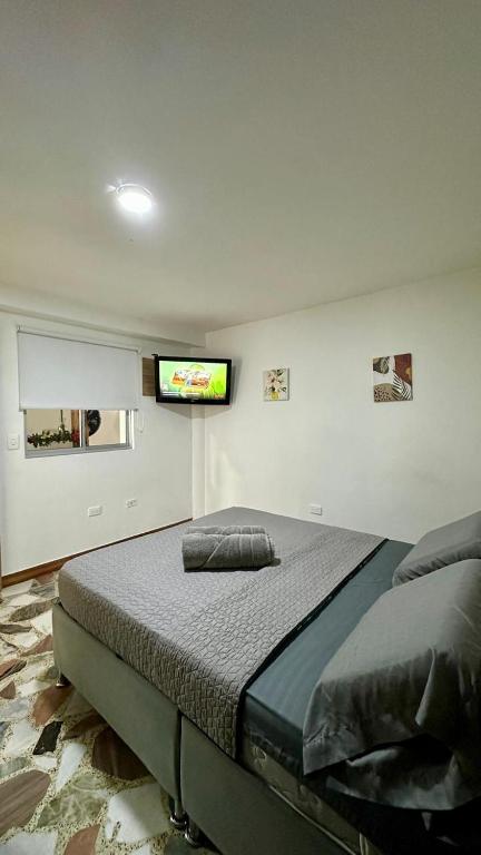 Postel nebo postele na pokoji v ubytování HOSTELFC CORFERIAS