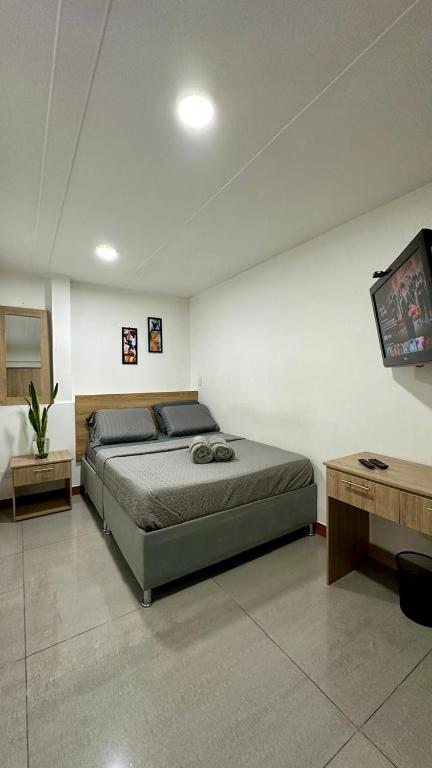 Postel nebo postele na pokoji v ubytování HOSTELFC CORFERIAS