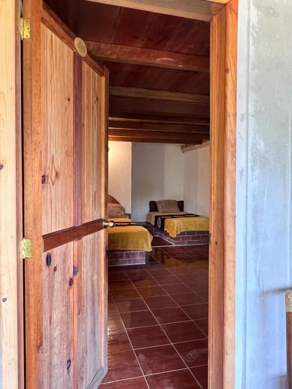 Letto o letti in una camera di Posada Quetzalin