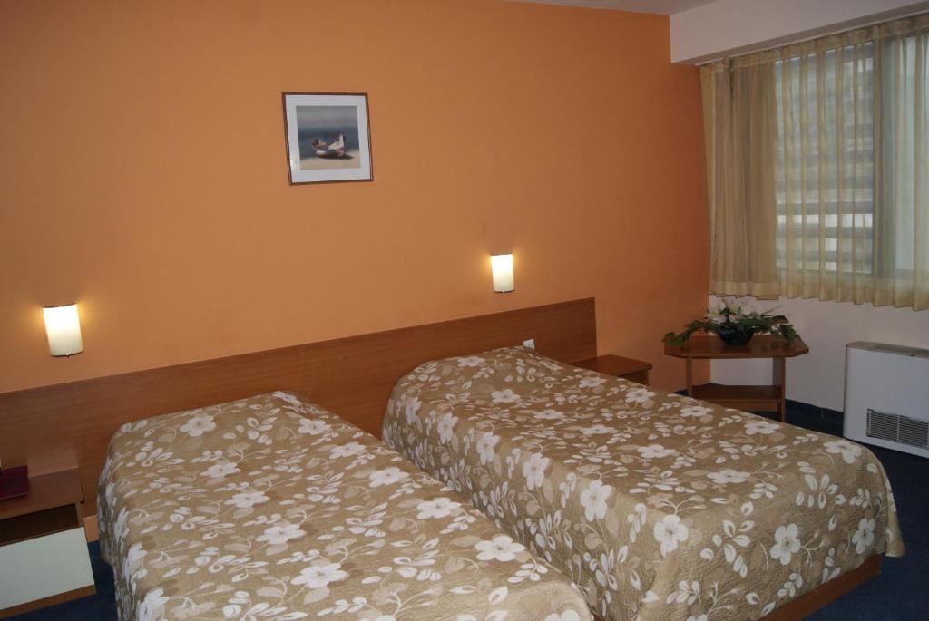 Postel nebo postele na pokoji v ubytování Hotel Fors