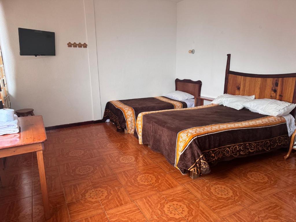 Letto o letti in una camera di Posada Quetzalin