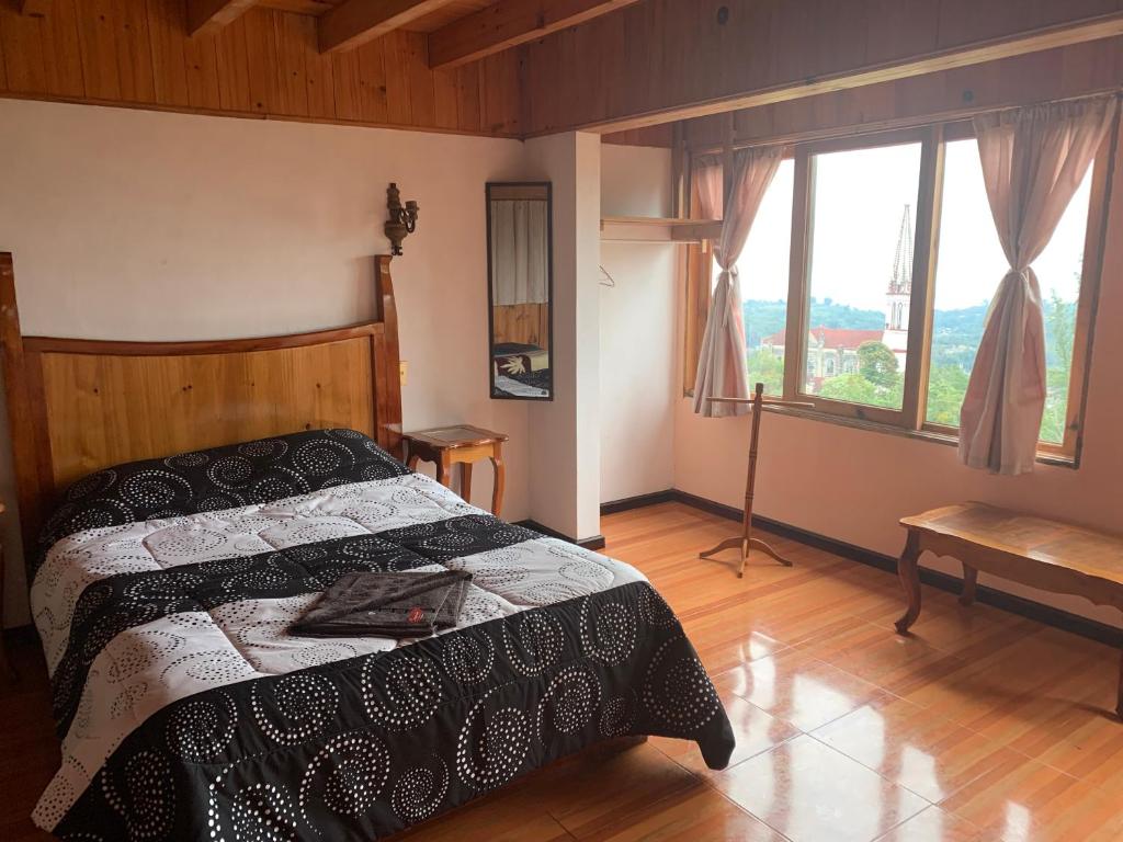 Letto o letti in una camera di Posada Quetzalin