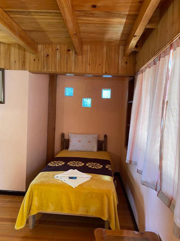 Letto o letti in una camera di Posada Quetzalin