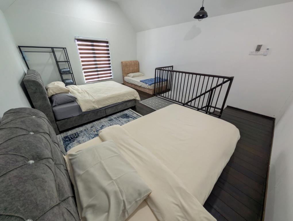 Postel nebo postele na pokoji v ubytování Flouzan Villa