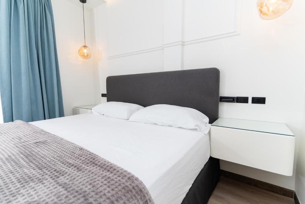 Postel nebo postele na pokoji v ubytování Hotel Boutique Las Mesetas
