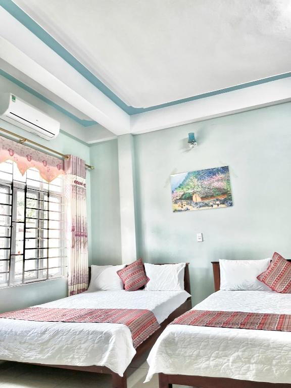 Postel nebo postele na pokoji v ubytování Local Ha Giang Tours & Hotel