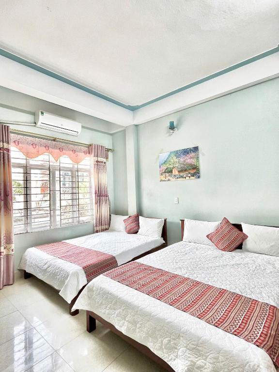 Postel nebo postele na pokoji v ubytování Local Ha Giang Tours & Hotel