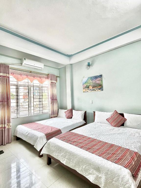 Postel nebo postele na pokoji v ubytování Local Ha Giang Tours & Hotel