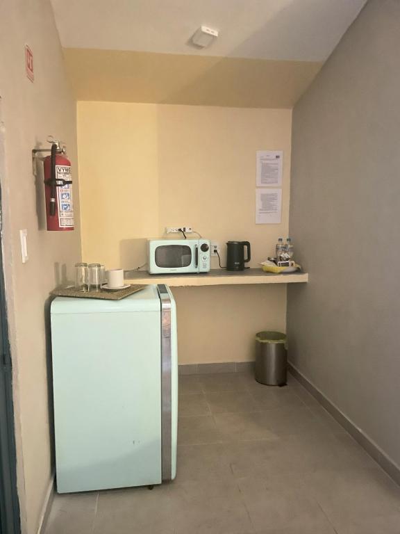 Kuchyň nebo kuchyňský kout v ubytování Cabaña Círculo Mágico