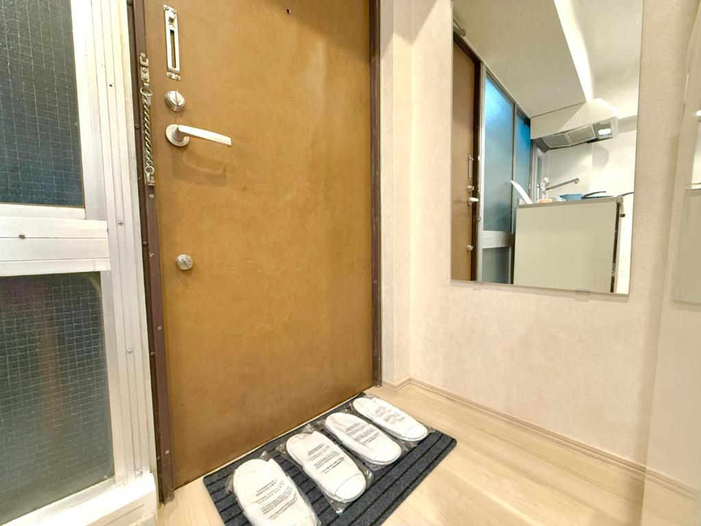 Kuchyň nebo kuchyňský kout v ubytování 東新宿駅新宿4人可 b2