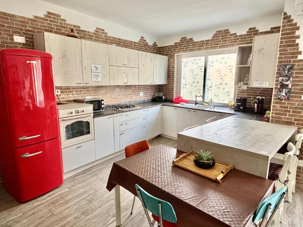 Kuchyň nebo kuchyňský kout v ubytování Cozy appartament sea view