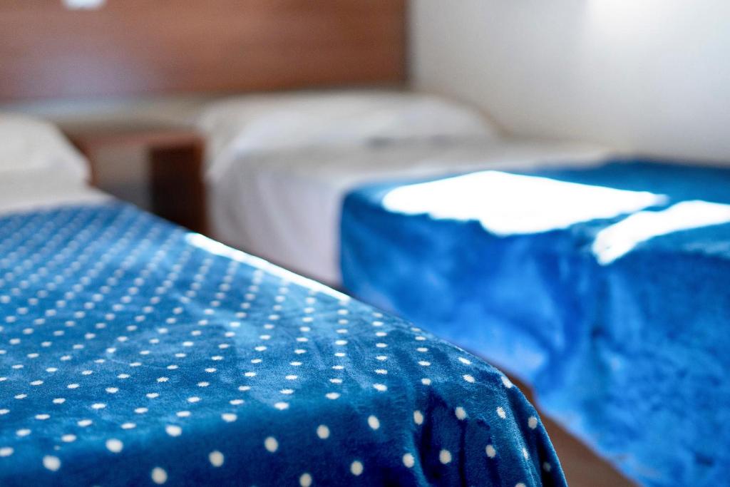 Postel nebo postele na pokoji v ubytování Camping Royal