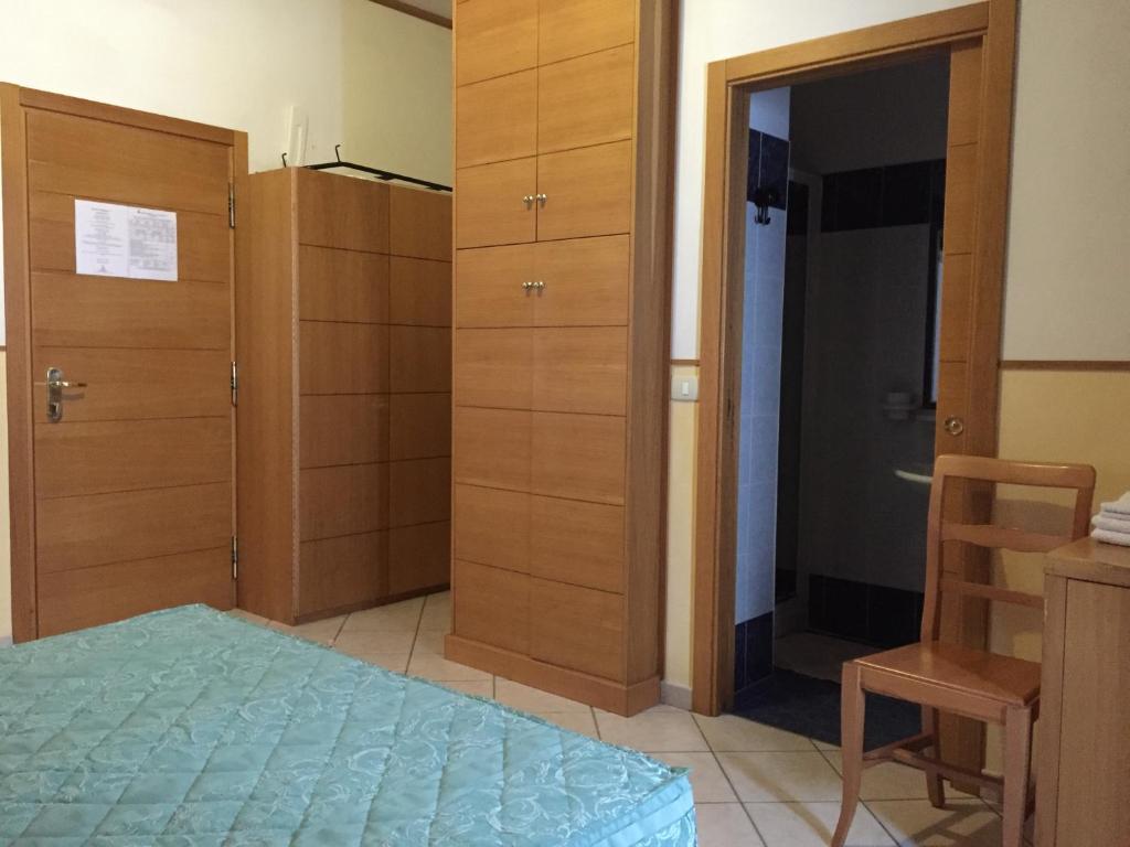 Postel nebo postele na pokoji v ubytování Hotel Vallefura
