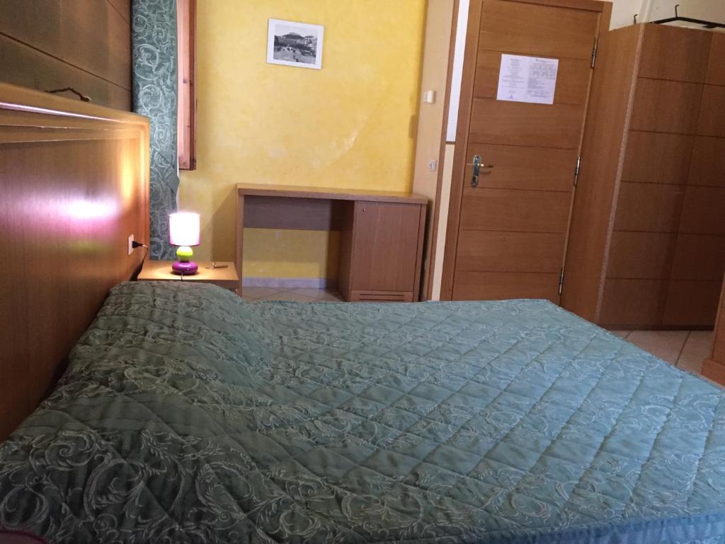 Postel nebo postele na pokoji v ubytování Hotel Vallefura