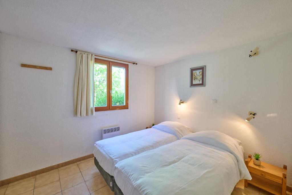 Postel nebo postele na pokoji v ubytování FranceComfort - L'Espinet