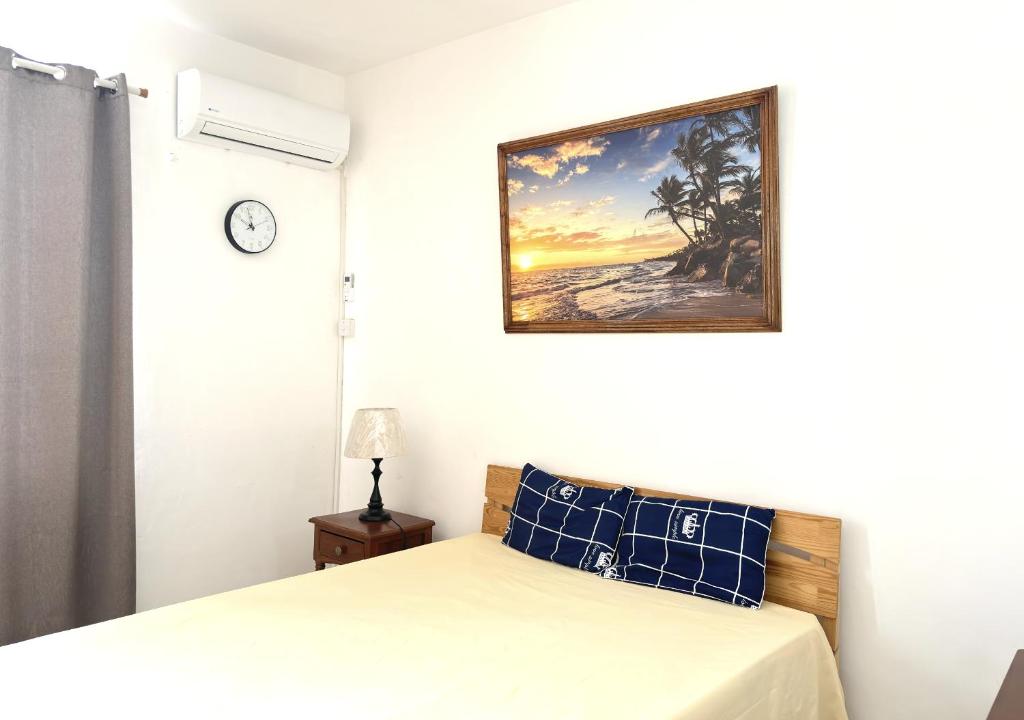Postel nebo postele na pokoji v ubytování La Clairière Tropicale 12 min de Belle Mare Plage