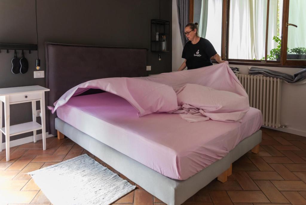 Posteľ alebo postele v izbe v ubytovaní Agriturismo Biomatto