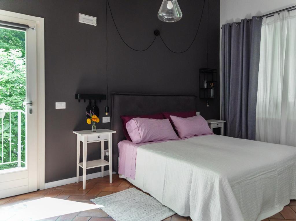 Posteľ alebo postele v izbe v ubytovaní Agriturismo Biomatto