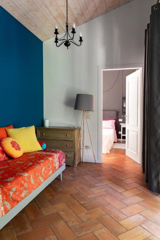 Posteľ alebo postele v izbe v ubytovaní Agriturismo Biomatto