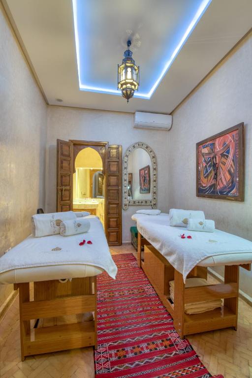 Postel nebo postele na pokoji v ubytování Palais Tara & Spa