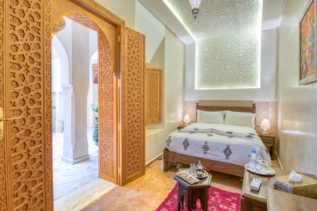 Postel nebo postele na pokoji v ubytování Palais Tara & Spa