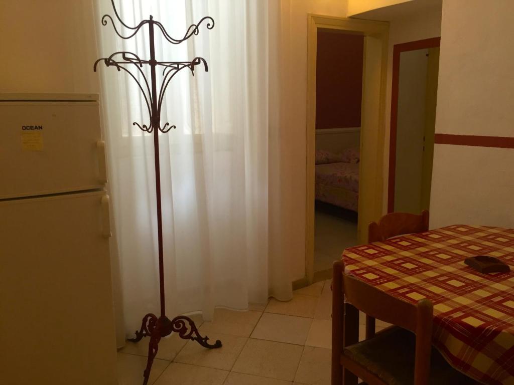 Postel nebo postele na pokoji v ubytování Albergo Ape Elbana