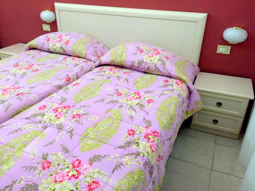 Postel nebo postele na pokoji v ubytování Albergo Ape Elbana