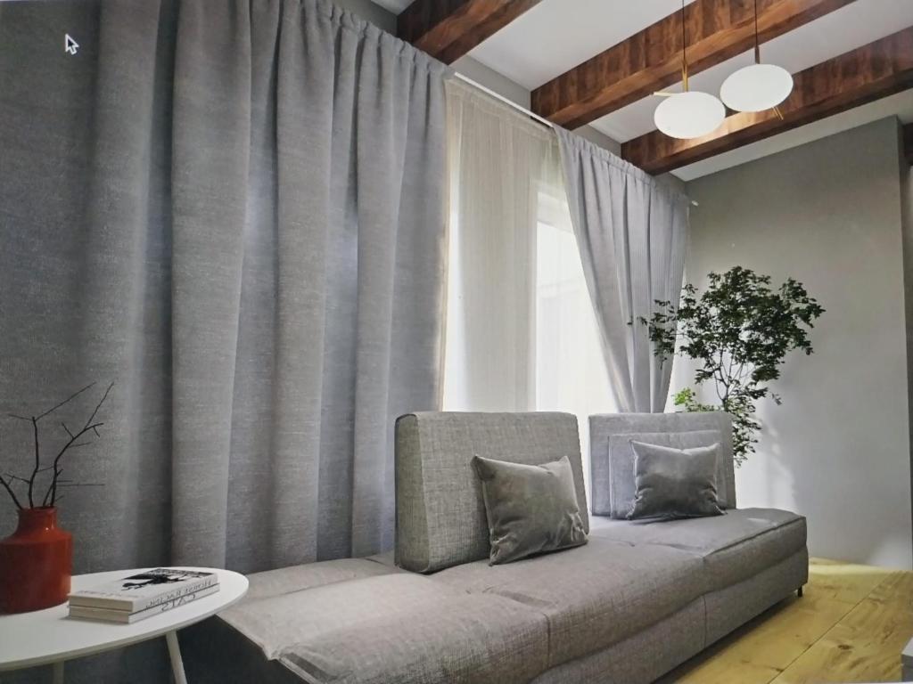 Posezení v ubytování Chiara Rooms