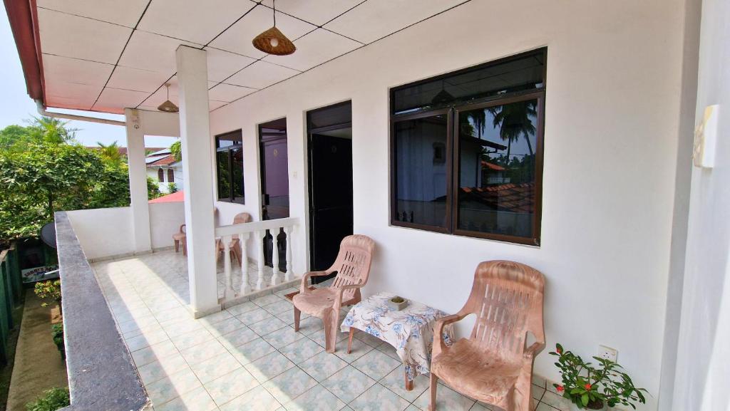 Balkón nebo terasa v ubytování E & C Guesthouse
