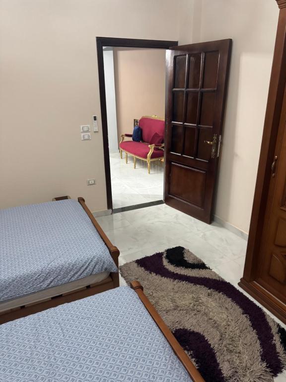 Postel nebo postele na pokoji v ubytování King Soliman Villa