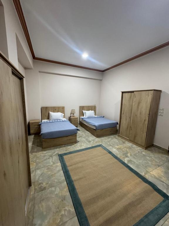 Postel nebo postele na pokoji v ubytování King Soliman Villa