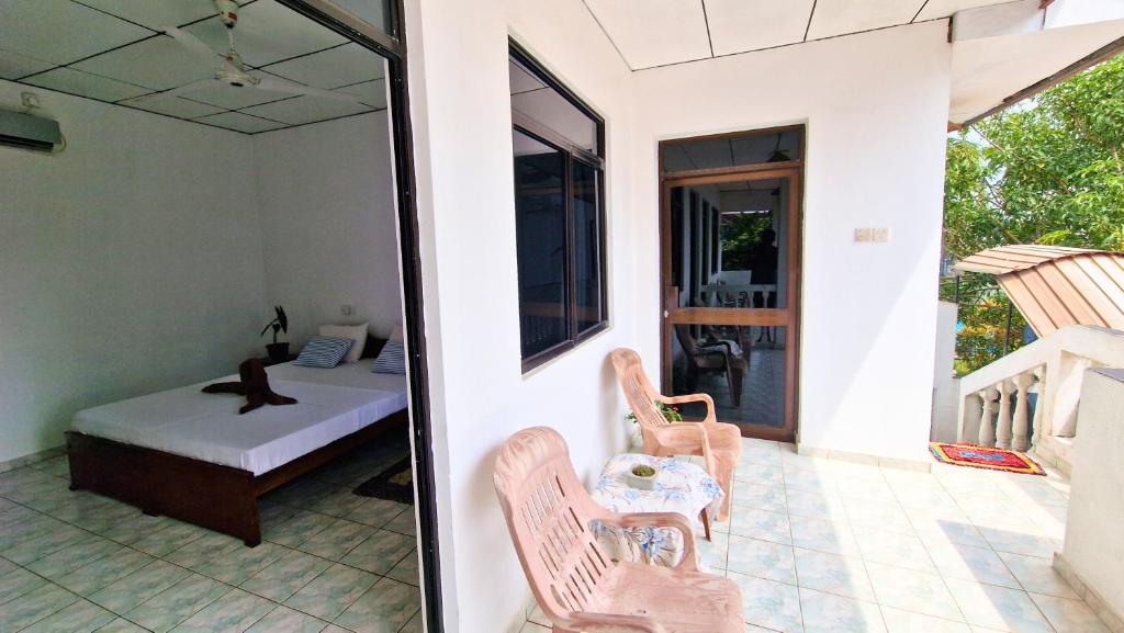 Balkón nebo terasa v ubytování E & C Guesthouse