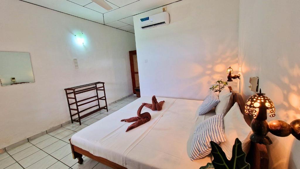 Postel nebo postele na pokoji v ubytování E & C Guesthouse