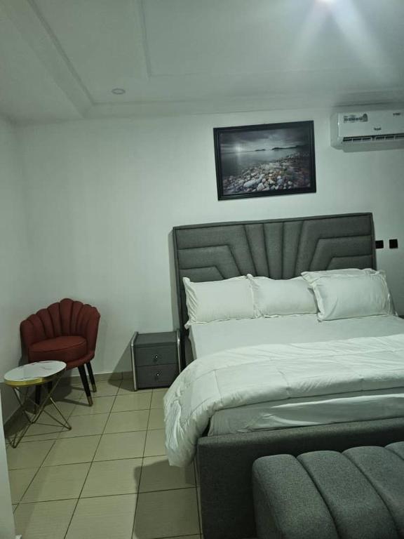 Postel nebo postele na pokoji v ubytování Molarans Place