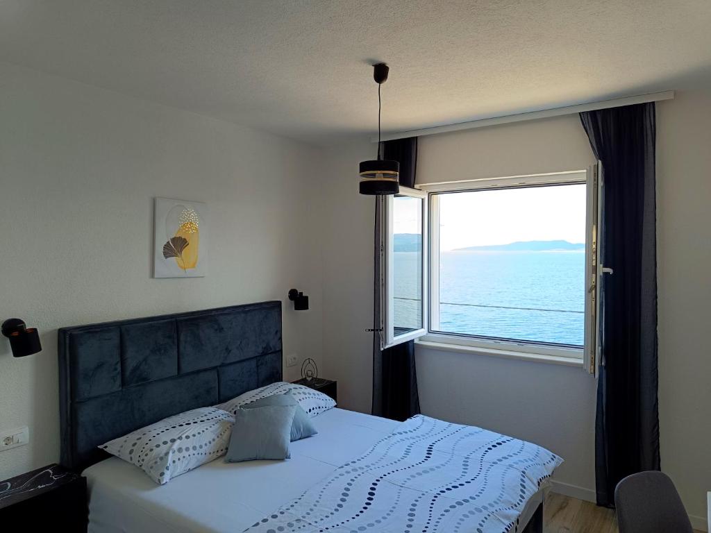 Posteľ alebo postele v izbe v ubytovaní Apartments Mirko