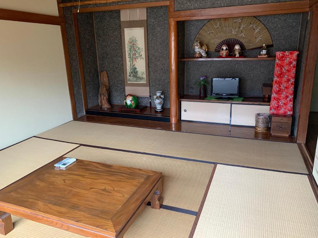 Kuchyň nebo kuchyňský kout v ubytování Grandma's island Home Hakata - Matsusaki inn 島のおばあちゃんち宿伯方 - 松崎旅館
