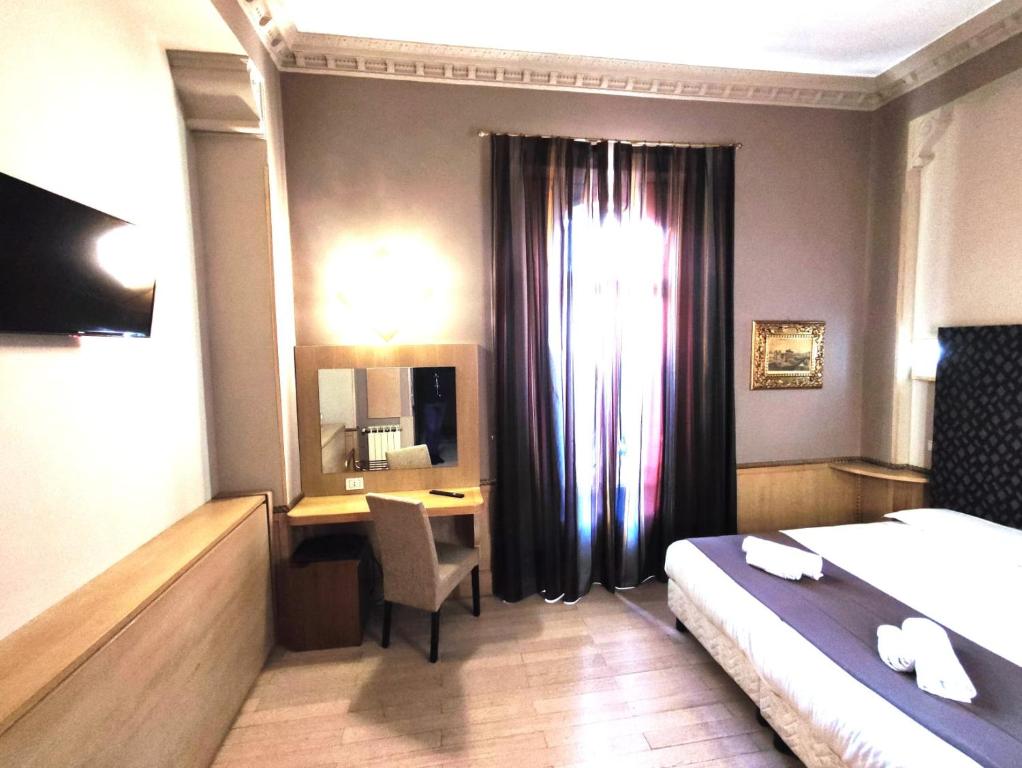 Postel nebo postele na pokoji v ubytování Hotel Nardizzi Americana