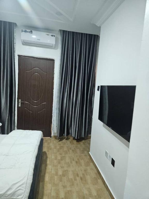 TV a/nebo společenská místnost v ubytování Molarans Place