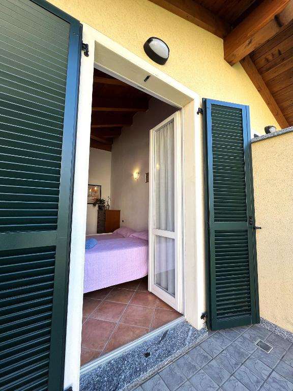 Postel nebo postele na pokoji v ubytování Dream Balcony on Lake Como