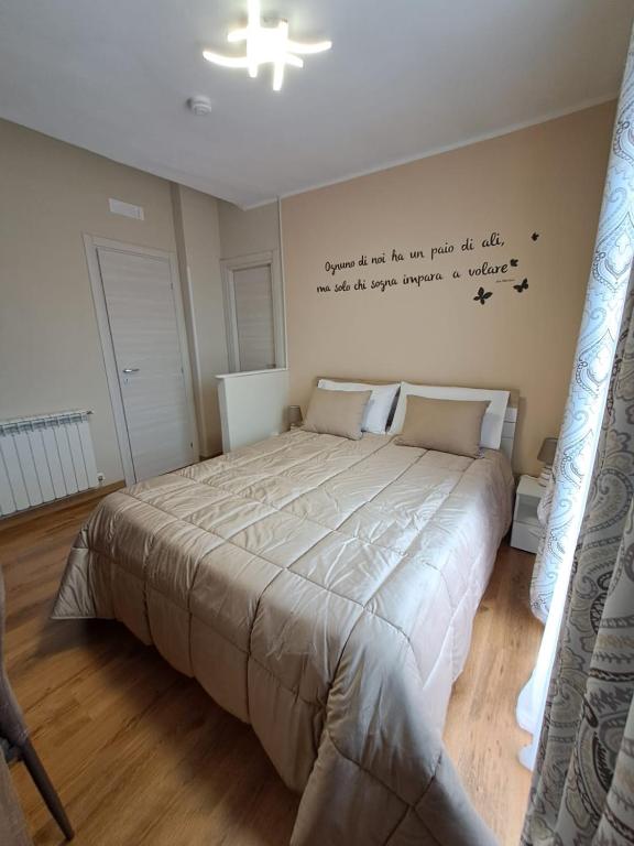 Postel nebo postele na pokoji v ubytování Il Geranio B&B