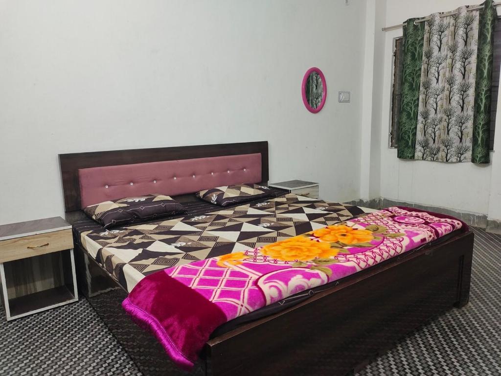 En eller flere senge i et værelse på Welcome to AG HOME STAY