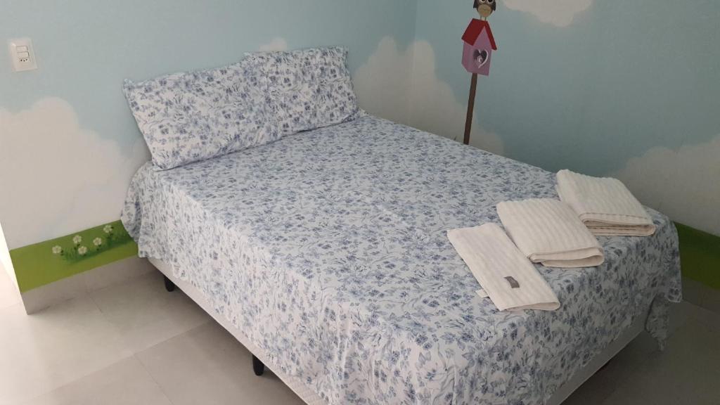Letto o letti in una camera di Casa Ideal e Confortável