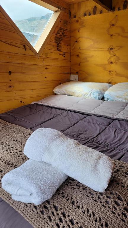 Postel nebo postele na pokoji v ubytování Klettern Tiny House - Lo de Juan